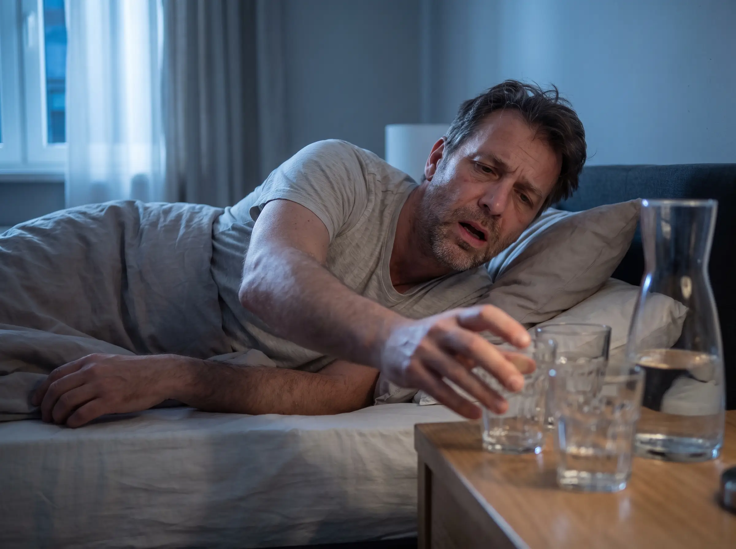 Awake at night with a dry mouth, reaching for water